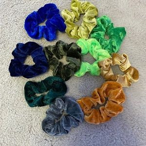 Blue, green, and orange hair ties